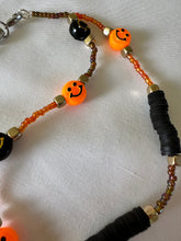 Load image into Gallery viewer, Phone Charm Orange & Black Smiley Faces