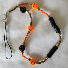 Load image into Gallery viewer, Phone Charm Orange & Black Smiley Faces