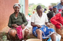 Load image into Gallery viewer, Knitted Laundry or Storage Basket in Multicolours