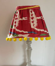 Load image into Gallery viewer, 26cm Pleated Red Ikat Silk Lampshade - Red, Green &amp; Yellow Pom Poms
