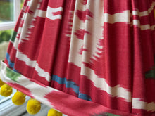 Load image into Gallery viewer, 26cm Pleated Red Ikat Silk Lampshade - Red, Green &amp; Yellow Pom Poms

